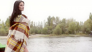 Beautiful babe posing on a boat